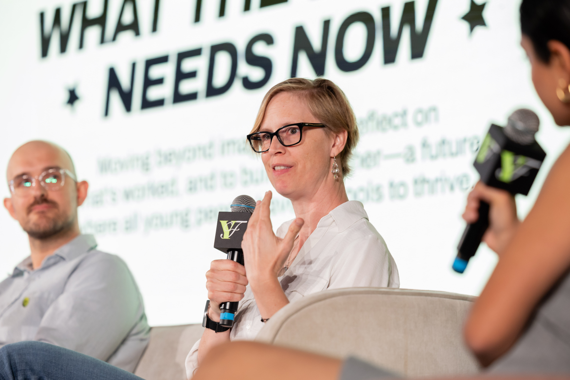 Charlotte Dungan speaking on a panel at the Young Futures Summit in Austin, 2026.
